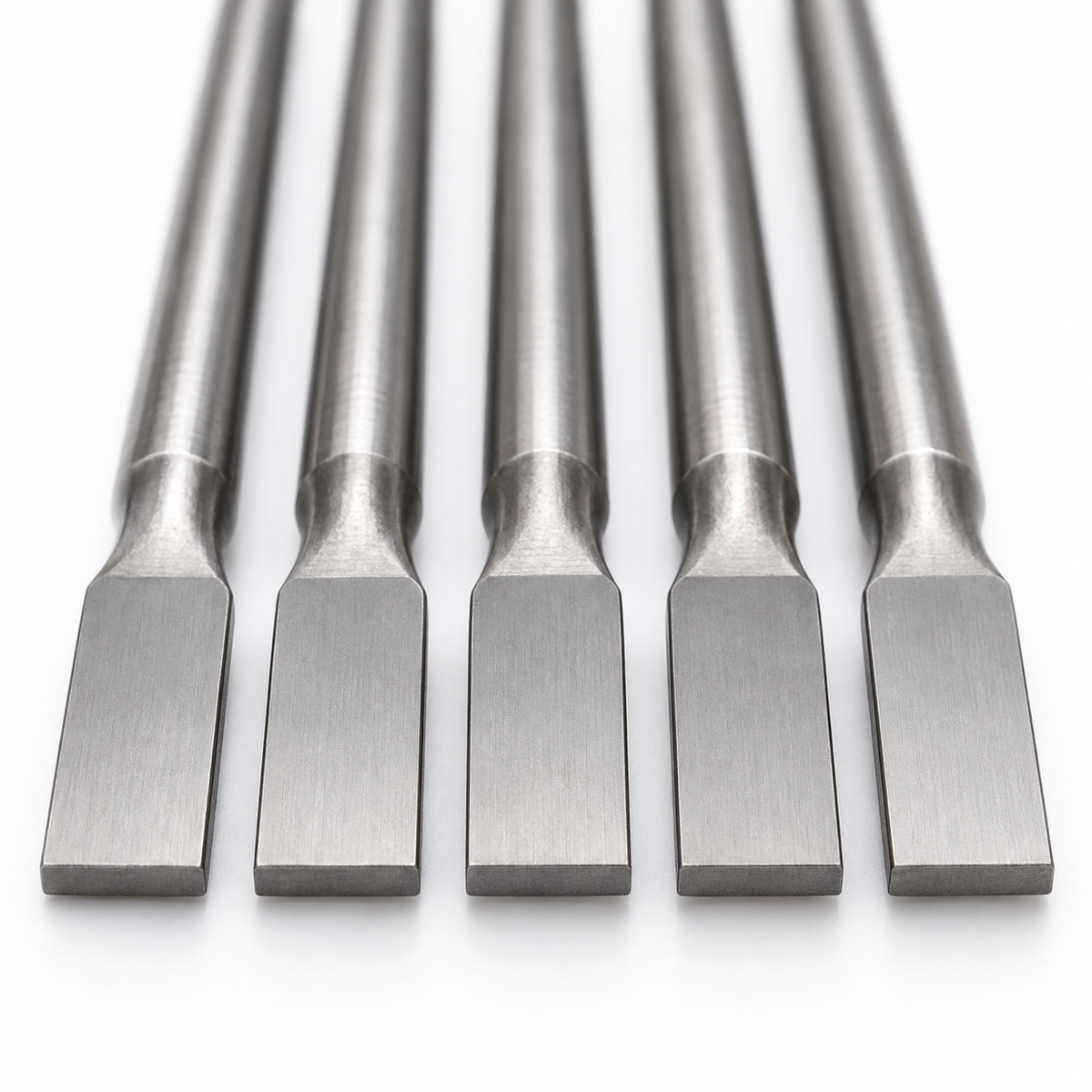 Close-up of precision-ground flat blade ejector pin tips