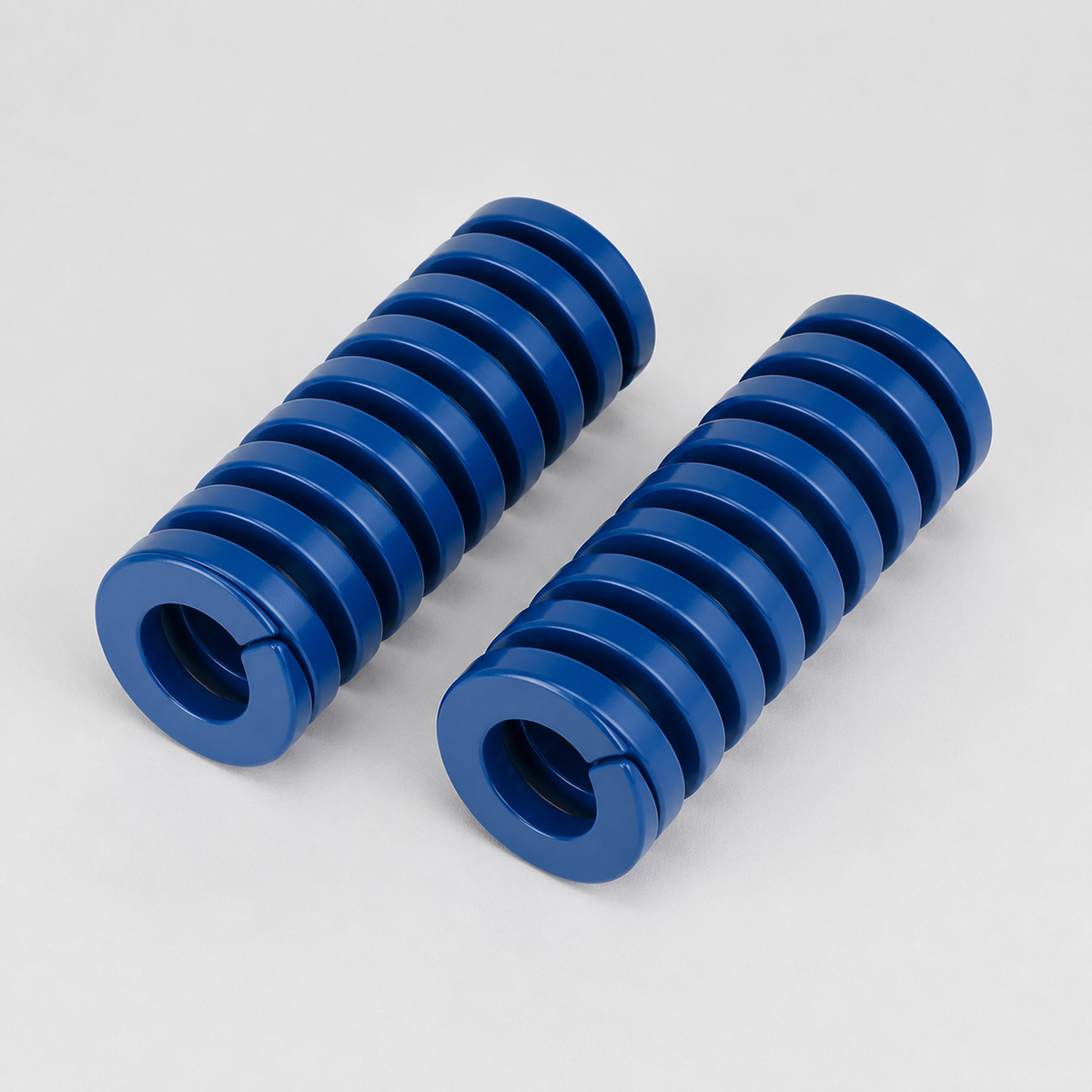 Blue rectangular-wire die springs angled product view